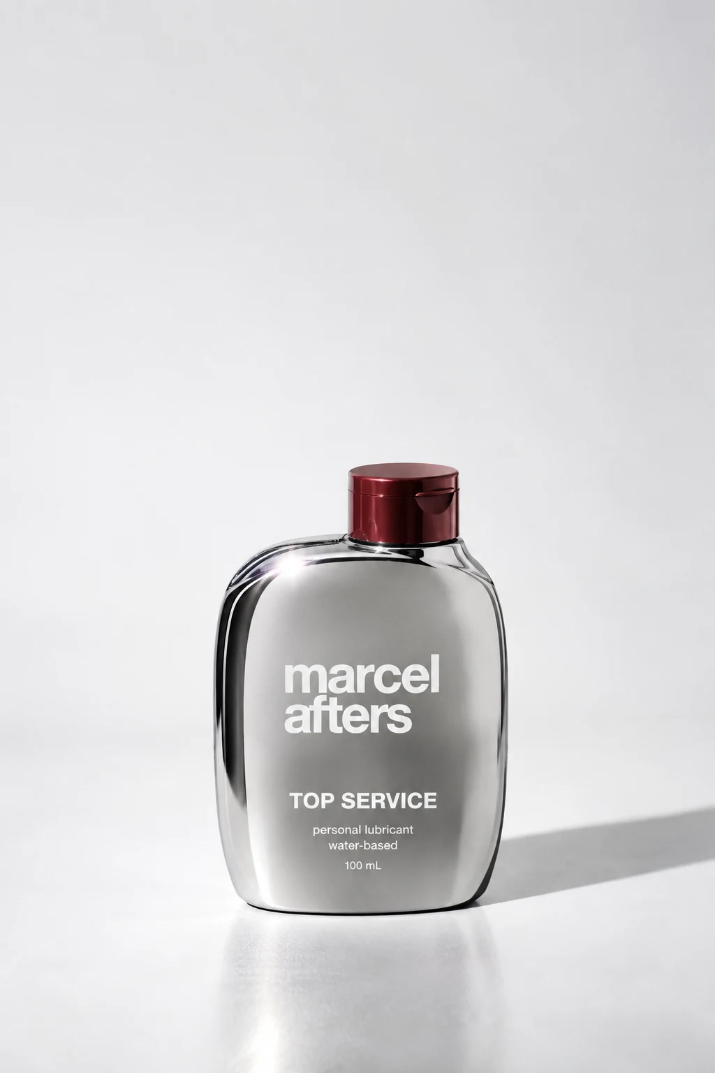 Top Service sculptural silver lube packaging concept